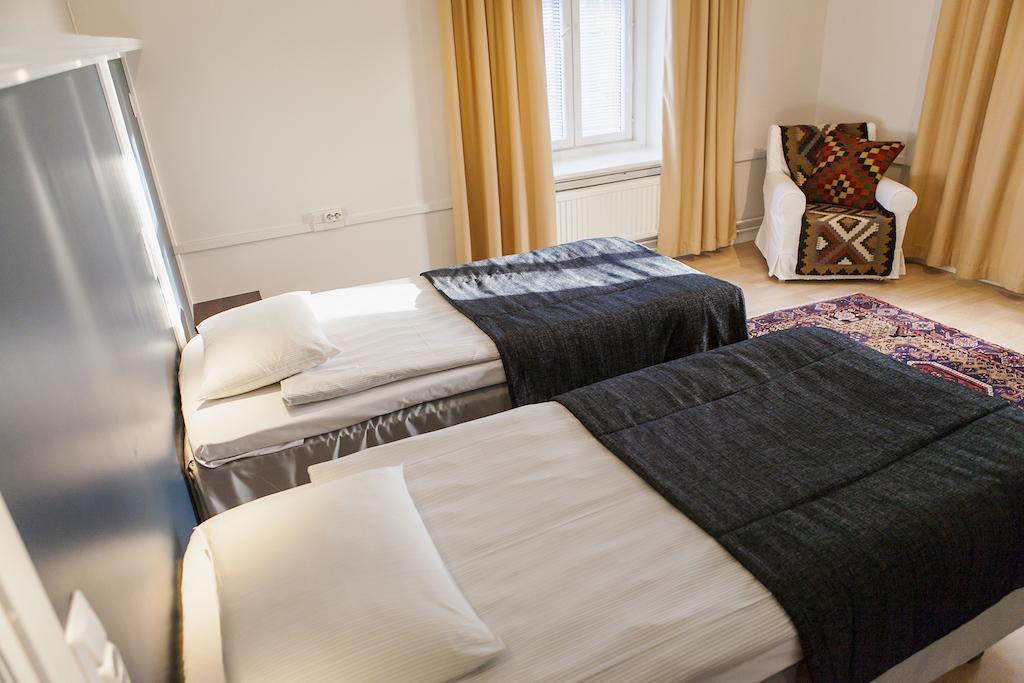 Hotelli Ville Apartment Tampere Szoba fotó